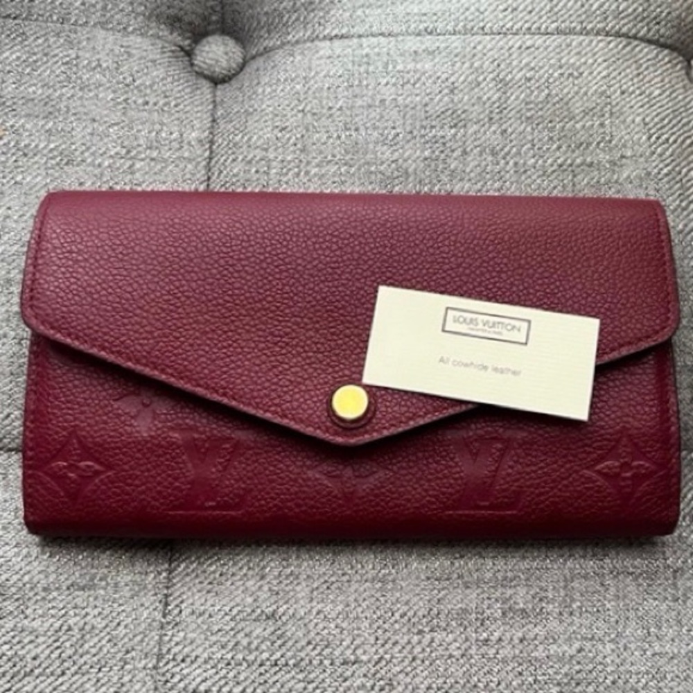 SOLD Authentic Louis Vuitton Dark Red Monogram Empreinte Sarah Wallet